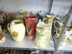 FOURTEEN VARIOUS VICTORIAN AND LATER POTTERY AND PORCELAIN JUGS (14)