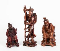 THREE CHINESE ROOT CARVINGS, two as seated fisherman (lacking rods) and another of a fisherman