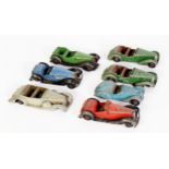 SEVEN DINKY TOYS - CIRCA 1940s DIE CAST SPORTS CARS, all in playworn and incomplete condition, all