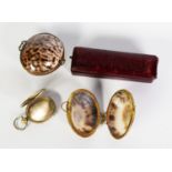 TWO VERY SIMILAR COWRIE SEASHELL AND GILT METAL SMALL BOXES/PURSES with wire pattern hinge and
