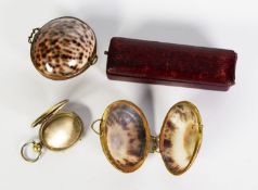 TWO VERY SIMILAR COWRIE SEASHELL AND GILT METAL SMALL BOXES/PURSES with wire pattern hinge and