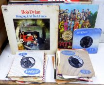 A collection of vinyl records ALBUMS by The Beatles, Bob Dylan, Harry Chapin, Linda Ronstadt etc.