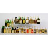 THIRTY NINE MAINLY VINTAGE MINIATURE BOTTLES OF BLENDED SCOTCH WHISKY, with levels of on or over the