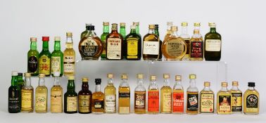 THIRTY NINE MAINLY VINTAGE MINIATURE BOTTLES OF BLENDED SCOTCH WHISKY, with levels of on or over the
