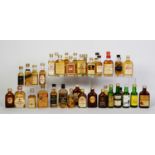 THIRTY NINE MAINLY VINTAGE MINIATURE BOTTLES OF BLENDED SCOTCH WHISKY, with levels on or over the