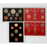 THREE PLASTIC CASED SETS OF 1965 and 1967 PRE-DECIMAL COIN SETS, ALSO A PLASTIC CASED PROOF SET OF