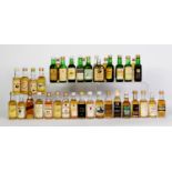 THIRTY NINE MAINLY VINTAGE MINIATURE BOTTLES OF BLENDED SCOTCH WHISKY, with levels on or over the