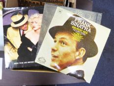 A selection of mixed genre vinyl record albums POP, ROCK, JAZZ, various artists groups to include