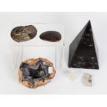 GEOLOGICAL INTEREST: a double ammonite fossil, an agate geode, a black marble obelisk and samples of
