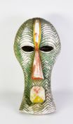 MID TO LATE 20TH CENTURY CAST FUNFARE MASK, 21 ¾” (54.5 cm) H