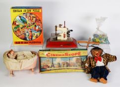 VINTAGE CHILD'S PAINTED WOOD SMALL DOLL'S CRIB, with clockwork musical and rocking action, 9 1/