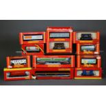 TWENTY ONE HORNBY RAILWAYS MINT AND BOXED OO GAUGE ITEMS OF GOOD ROLLING STOCK, with some larger