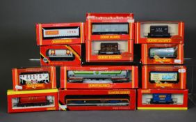 TWENTY ONE HORNBY RAILWAYS MINT AND BOXED OO GAUGE ITEMS OF GOOD ROLLING STOCK, with some larger