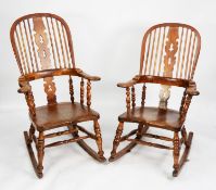 NEAR PAIR OF NINETEENTH CENTURY ELM AND FRUITWOOD WINDSOR ROCKING CHAIRS, each with two pierced