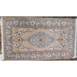 KASHMIRI HAND-AMDE KIRMAN STYLE RUG with pale blue and ivory stripped lozenge shaped centre