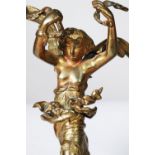 NEAR MATCHING PAIR OF RUSSIAN STYLE GILT METAL FIGURES, each modelled as a semi naked, winged female