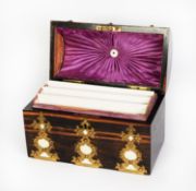 VICTORIAN AMBOYNA AND BRASS MOUNTED DOME TOP STATIONERY BOX, with fancy, studded strap work panels