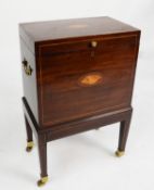 GEORGE III INLAID MAHOGANY CELLARETTE, the oblong top with oval shell inlay, set above a matching