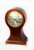 EDWARDIAN LINE INLAID MAHOGANY LARGE BALLOON SHAPED MANTLE CLOCK, with 6” silvered Roman dial, brass