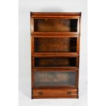 GLOBE WERNICKE FOUR SECTION STACKING BOOKCASE, with glazed doors, cornice section and long drawer to
