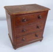 APPRENTICE PIECE, VICTORIAN MAHOGANY CHEST OF THREE LONG DRAWERS, with rounded oblong top, turned