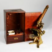 BAKER, HIGH HOLBORN, LATE 19th CENTURY LARGE COMPOUND ALL-BRASS MICROSCOPE, with numerous lenses, in