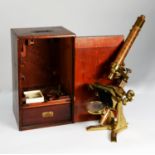 BAKER, HIGH HOLBORN, LATE 19th CENTURY LARGE COMPOUND ALL-BRASS MICROSCOPE, with numerous lenses, in