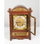 EARLY TWENTIETH CENTURY BRASS MOUNTED OAK MANTEL CLOCK, the 7” brass dial with silvered chapter