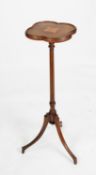 EDWARDIAN INLAID MAHOGANY TORCHERE, the clover or club shaped top with diamond shaped fan inlay to