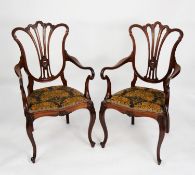 PAIR OF EDWARDIAN CARVED MAHOGANY CARVER TYPE OPEN ARMCHAIRS FROM A DRAWING ROOM SUITE, each with