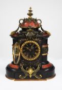 LATE VICTORIAN GILT METAL MOUNTED BLACK SLATE AND RED VEINED MARBLE LARGE MANTLE CLOCK, the 4” Roman