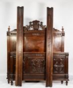 EARLY TWENTIETH CENTURY FRENCH CARVED OAK DOUBLE BED FRAME, the panelled