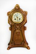 EARLY TWENTIETH CENTURY ART NOUVEAU GILT SPELTER MANTLE CLOCK, the 3 ¼” enamelled Arabic dial with