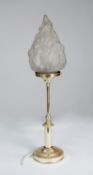 PLATED METAL TABLE LAMP with slender column and circular foot supporting a frosted glass flambeau