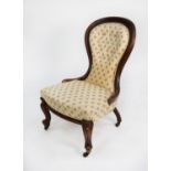 LATE NINETEENTH CENTURY MAHOGANY STAINED FRUITWOOD LADY’S EASY CHAIR, the moulded show wood frame