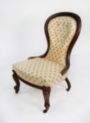 LATE NINETEENTH CENTURY MAHOGANY STAINED FRUITWOOD LADY’S EASY CHAIR, the moulded show wood frame