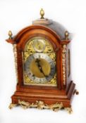 LATE NINETEENTH CENTURY GILT METAL MOUNTED WALNUT BRACKET CLOCK, the 6 ½” brass dail with silvered