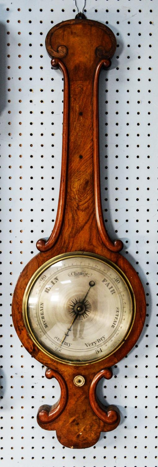 VICTORIAN FIGURED WALNUT BANJO BAROMETER, with 10” silvered dial, in an arch topped case with