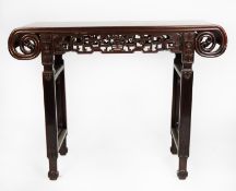 LATE NINETEENTH/ EARLY TWENTIETH CENTURY CHINESE CARVED HUANGHUALI WOOD SIDE TABLE, the oblong top