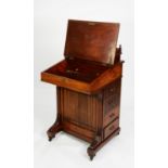 VICTORIAN AESTHETICS MOVEMENT CARVED WALNUT DAVENPORT DESK, the raised stationary compartment with