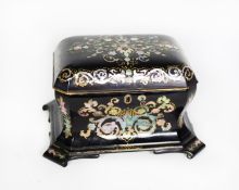 VICTORIAN BLACK LACQUERED PAPIER MACHE AND MOTHER OF PEARL INLAID TEA CADDY, of canted and waisted