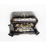 VICTORIAN BLACK LACQUERED PAPIER MACHE AND MOTHER OF PEARL INLAID TEA CADDY, of canted and waisted