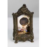LATE NINETEENTH CENTURY FRENCH MOULDED WHITE METAL AND ENAMELLED SMALL MANTLE OR DRESSING TABLE