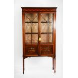 EDWARDIAN LINE INLAID AND PAINTED MAHOGANY DISPLAY CABINET, the moulded cornice set above a frieze