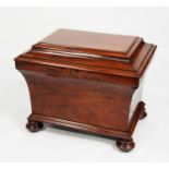 WILLIAM IV FIGURED MAHOGANY CELLARETTE, the cushion moulded oblong top enclosing an eight division