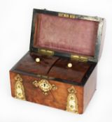 VICTORIAN FIGURED WALNUT AND BRASS BOUND DOME TOP TEA CADDY, the interior with conforming, pair of