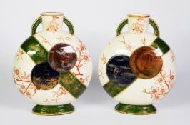 PAIR OF VICTORIAN AESTHETICS MOVEMENT POTTERY TWO HANDLED MOON FLASKS, each printed with disc shaped