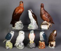 SIX MODERN BESWICK BIRD OF PREY PATTERN POTTERY BENEAGLES SCOTCH WHISKY DECANTERS, comprising: