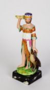 VICTORIAN PEARLWARE POTTERY FIGURE OF MOSES, painted in colours and modelled standing, with an eagle
