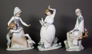 THREE MODERN LLADRO & NAO PORCELAIN FEMALE FIGURES, one with a goose, the Nao figure with doves,